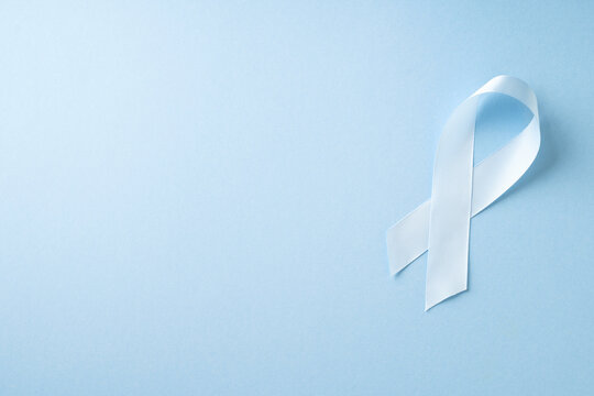 World diabetes day, cancer concept with ribbon on blue background