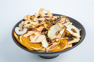 Dried fruits isolated on white background. Healthy eating concept. Top view. Healthy vegetarian food concept. Dried fruit chips.