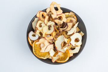 Dried fruits isolated on white background. Healthy eating concept. Top view. Healthy vegetarian food concept. Dried fruit chips.