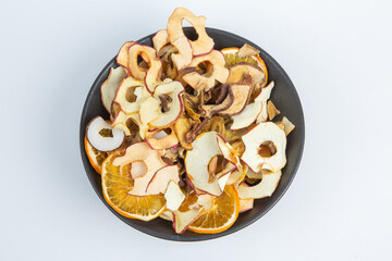 Healthy vegetarian food concept. Assortment of dried fruits, nuts and seeds on white background. Top view. Mixed nuts set closeup.