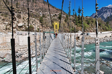 The bridge on Swat river in the valley of Himalayas, Pakistan © Sergey