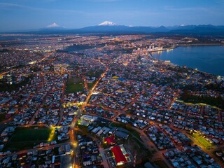 Bird's-eye view of the Puerto Montt city in the evening lights