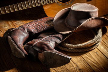 Country music festival live concert with acoustic guitar, cowboy hat and boots