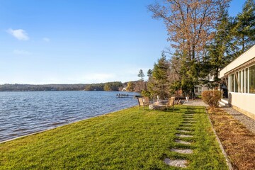 View of the lake from the lakefront home on a sunny day