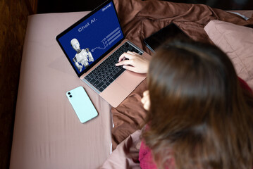 Woman using computer chat with AI on website