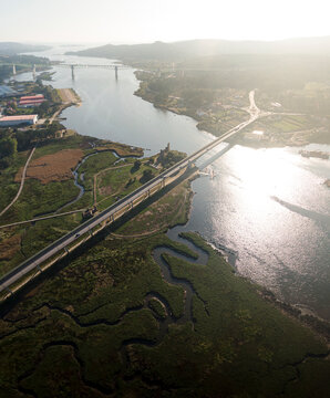 Aerial view of Vikings towers, Torres de Oeste and natural marshes by Ulla river in Catoira, Pontevedra, Galicia, Spain.