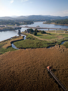 Aerial view of Vikings towers, Torres de Oeste and natural marshes by Ulla river in Catoira, Pontevedra, Galicia, Spain.