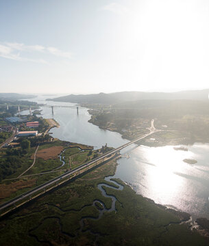 Aerial view of Vikings towers, Torres de Oeste and natural marshes by Ulla river in Catoira, Pontevedra, Galicia, Spain.