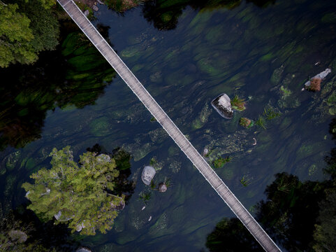 Aerial view of Parada hanging bridge over the Mi&ntilde;o river in Outeiro de Rei, Lugo, Galicia, Spain.