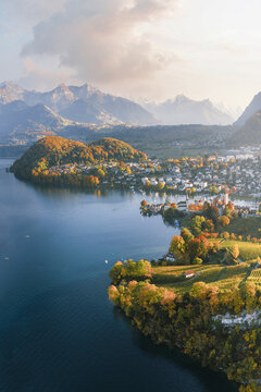 Aerial view Lake Thun and Spiez at late afternoon with a stunning view over the Swiss Alps, Lake Thun, Bern, Switzerland.