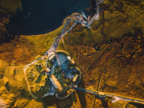 Aerial view of a Viking village along the lake in Austurland, Iceland.