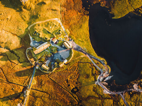 Aerial view of a Viking village along the lake in Austurland, Iceland.