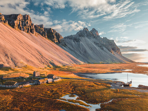 Aerial view of a Viking village with Vestrahorn Mountain in background, Austurland, Iceland.