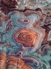 Vertical shot of the beautiful natural sandstone with unique patterns and shades.