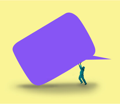Man pushing large blank speech bubble