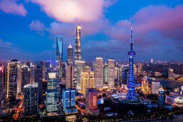 Aerial view of Shanghai skyline and modern buildings at night, China.