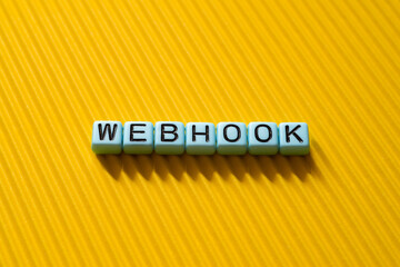 Webhook - word concept on cubes - obrazy, fototapety, plakaty