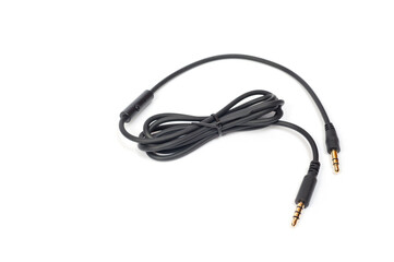 Black cord with a mini jack for connecting various gadgets, shot on a white background.