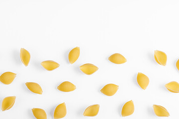 Pasta products in the form of a shell, texture, on a white background