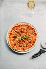 Traditional Italian pizza, vegetables, ingredients on a light background.Pizza menu. View from above. Place for text.
