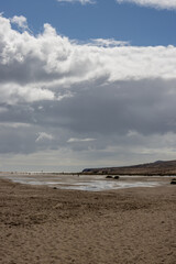 Fototapeta na wymiar Calm Atlantic ocean and a cloudy sky, Fuertventura
