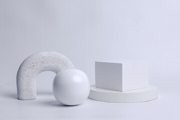 Front view of white podium with blank space for product mock up