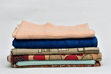 A stack of kitchen towels, napkins, for drying hands.