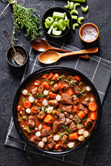boneless beef short ribs stew in black bowl