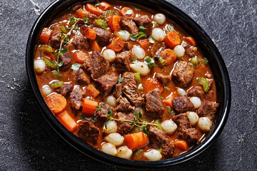 boneless beef short ribs stew in black bowl