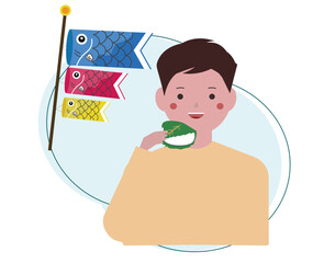 こどもの日に柏餅を食べる男の子