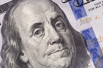 close up of Franklin on one hundred US dollars banknote