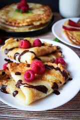 Delicious pancakes with berries and honey. Sweet food. Morning