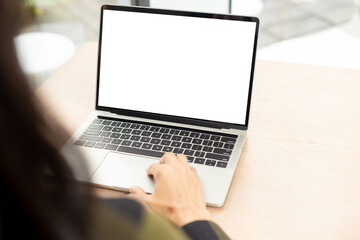 computer screen blank mockup.hand woman work using laptop with white background for advertising,contact business search information on desk at coffee shop.marketing and creative design