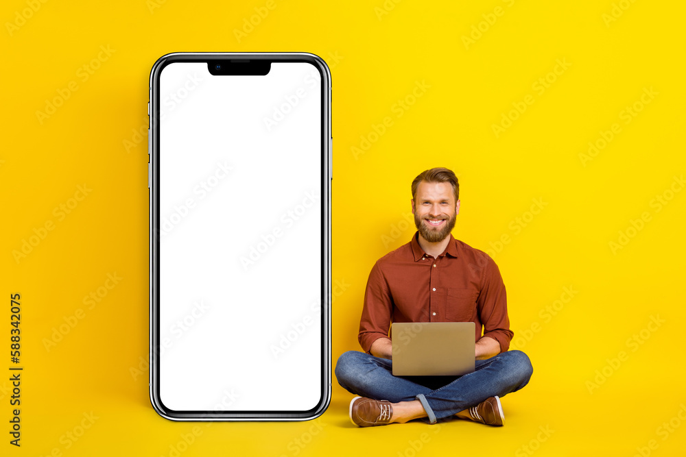 Aufkleber full size photo of handsome guy sit floor use netbook empty space telephone display isolated on yell