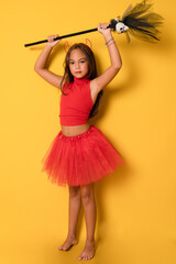 Closeup photo of funny little lady with long hair and headband playing helloween party satan devil...