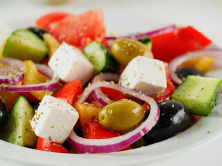 Greek salad on the table, close up