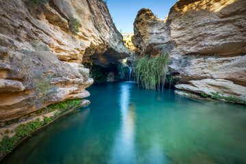 Beautiful surroundings of a waterfall called Salto del Usero in Bullas, Murcia, Spain. Blue and...