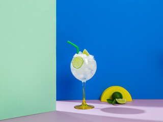 gin cocktail served with iced alcoholic beverage, colored background