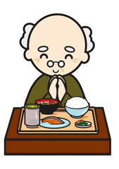 和食の食事に手を合わせるお爺ちゃん