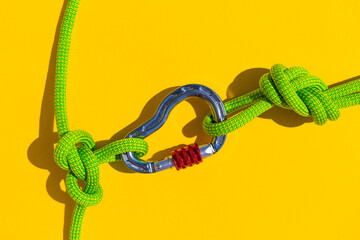 carabiner with rope. Equipment for climbing and mountaineering. Safety rope. Node eight. Minimal...