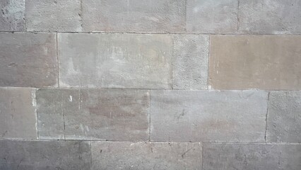 Textured stone sandstone surface. Close up image bricks
