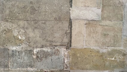 Textured stone sandstone surface. Close up image bricks
