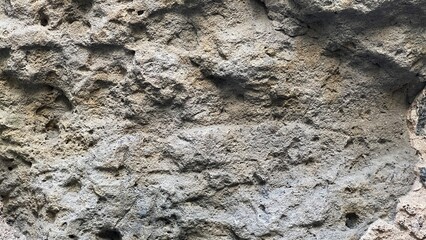 Textured stone sandstone surface. Close up image bricks
