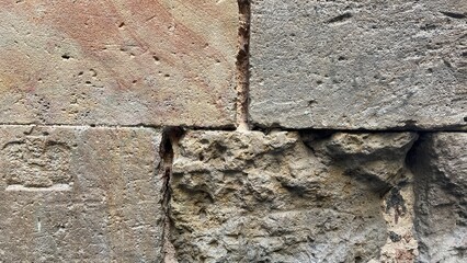 Textured stone sandstone surface. Close up image bricks
