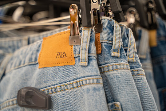Jeans and tag in the Zara store. Belgrade, Serbia - April 1, 2023.