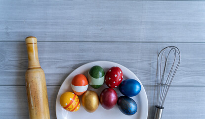 Happy Easter concept with Eggs a roller and a whisk, Selective focus