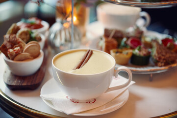 a close up of a cup of coffee on a table