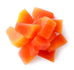 Pile of papaya pieces on a white background. Top view