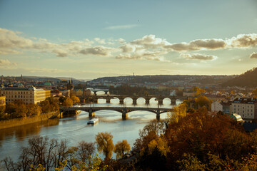Obraz premium landscape with Vltava river, Karlov most and boat