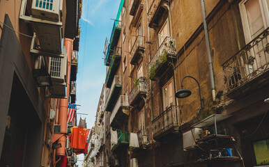 Fototapeta na wymiar Typical street with houses in Italy.